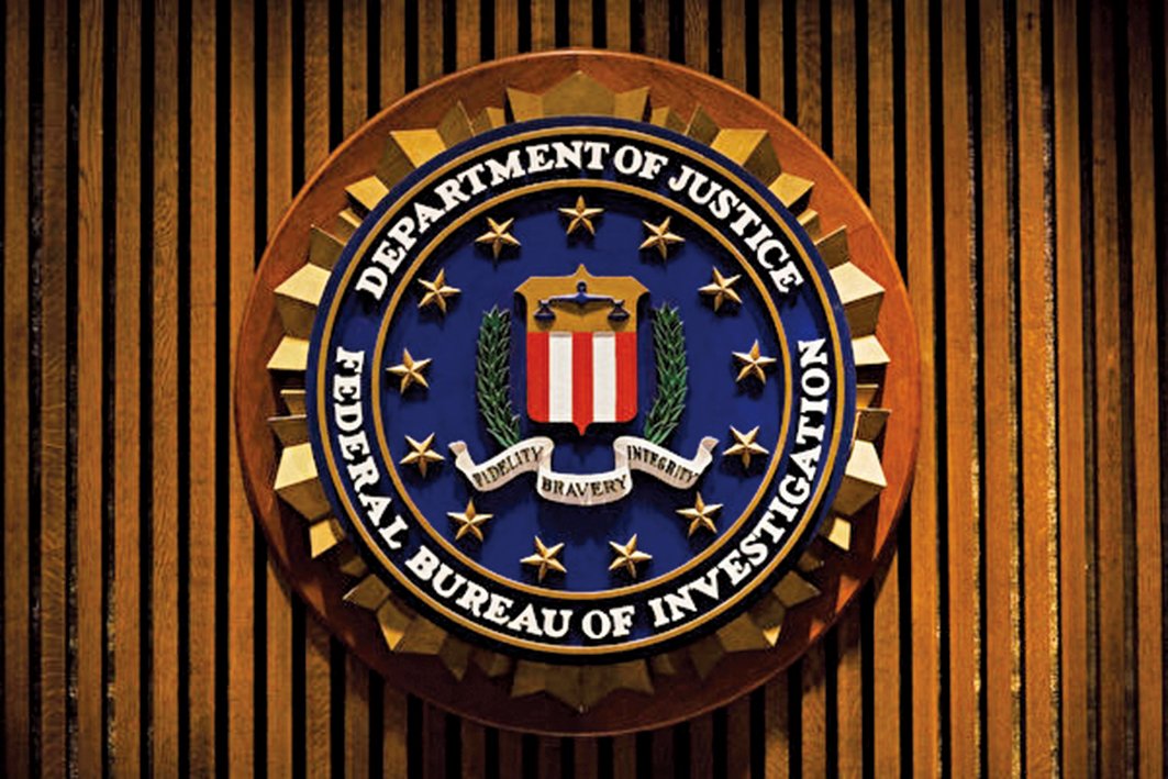 圖為美國聯邦調查局Logo。（AFP）