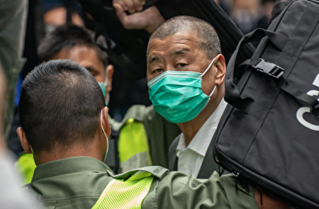 2021年2月9日，《蘋果日報》創辦人黎智英，在保釋聽證會前抵達香港終審法院。（Anthony Kwan/Getty Images）