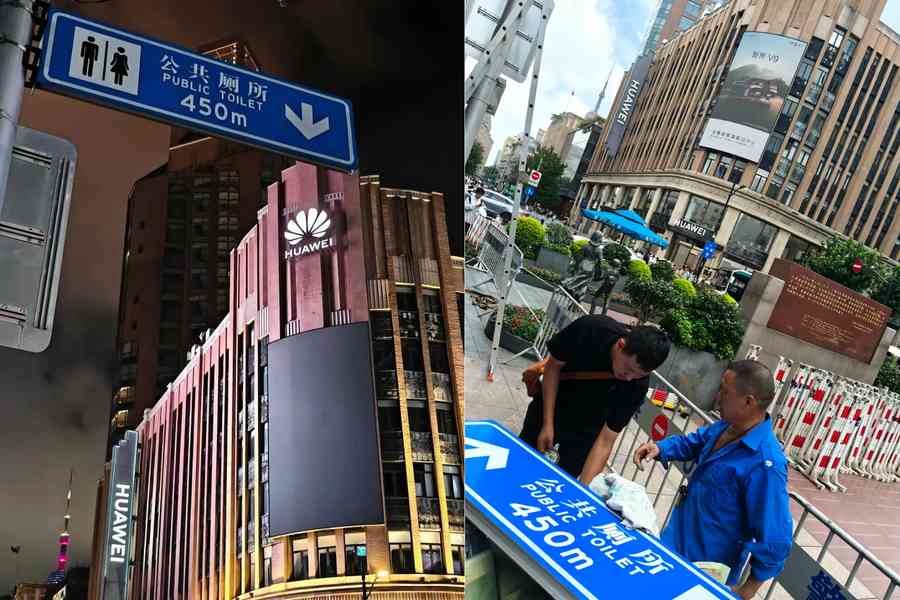 只因與華為「同框」 上海一公廁指示牌遭撤