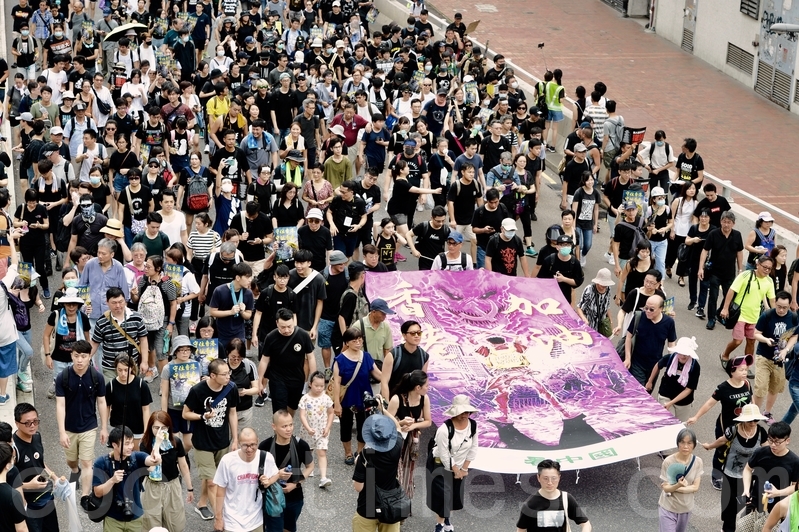 反修訂《逃犯條例》遊行「遍地開花」，繼7月7日的香港九龍區23萬人大遊行之後，周日「7‧14」沙田區舉辦反送中大遊行。（宋碧龍／大紀元）