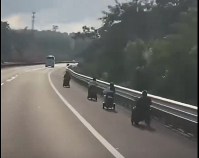 海南多名老人開電動三輪車衝上高速