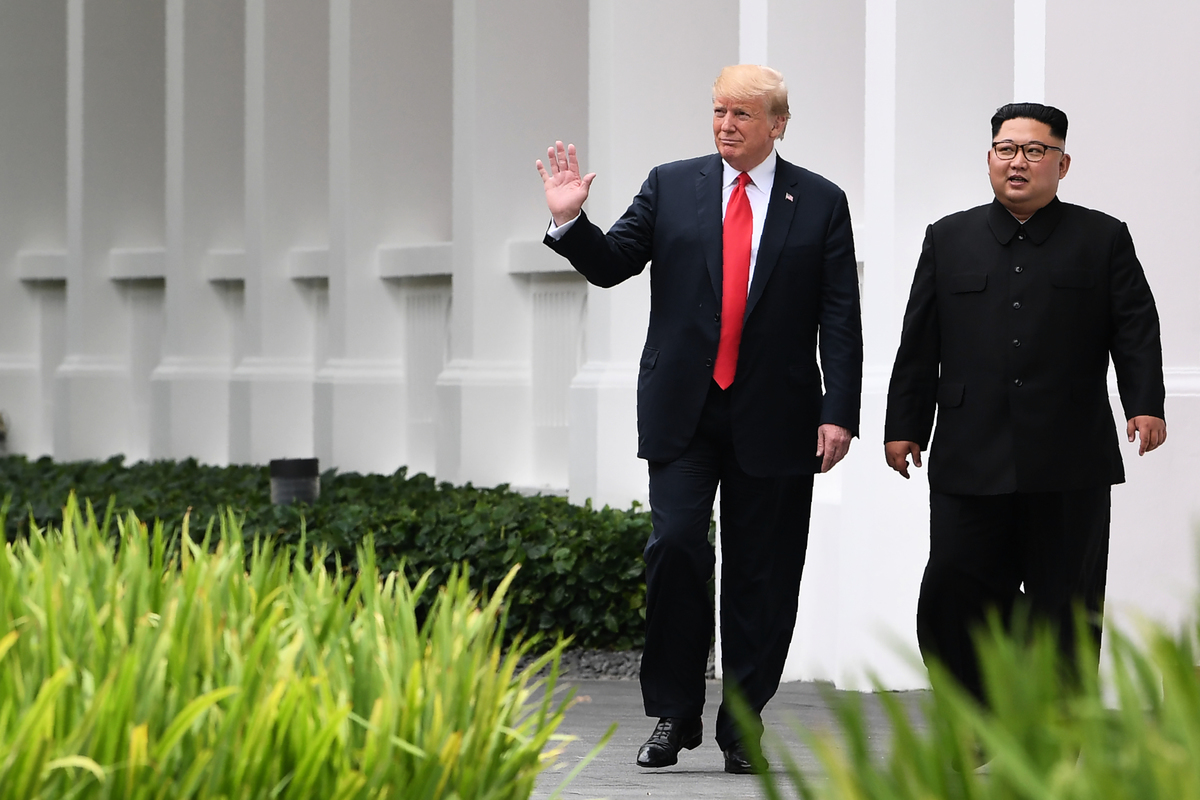 去年6月特朗普與金正恩在新加坡首次會晤，如今將在越南再會，雙方各有籌謀。（SAUL LOEB/AFP/Getty Images）