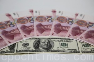 人民幣兌美元一度跌至7.48 北京蓄意為之？