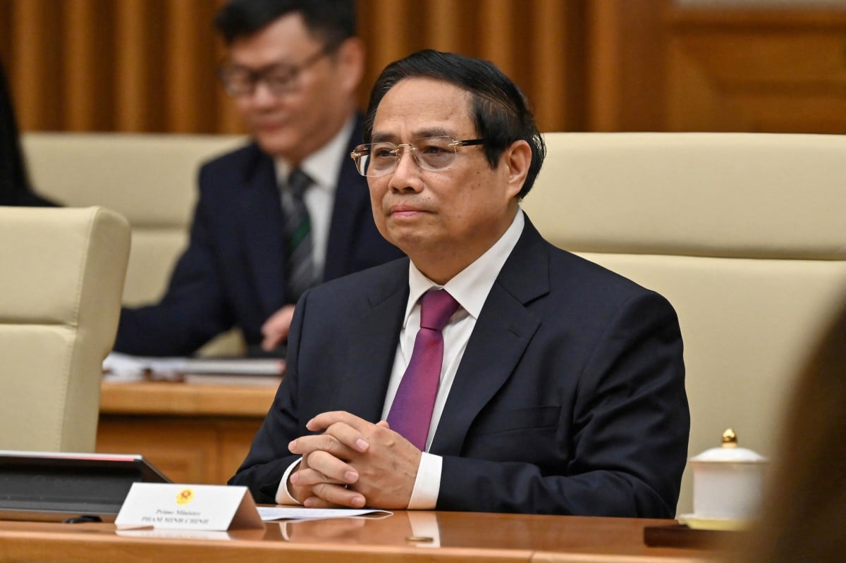 越南貿易部近日發布一項新規,加強打擊出口商將商品非法轉運到美國和其它目的地,以防止中國企業通過越南「洗產地」。圖為越南總理范明正。(Nhac NGUYEN / POOL / AFP)