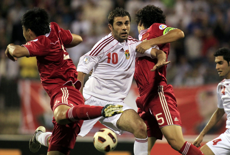 2011年世界盃亞洲區預選賽20強賽，中國男足客場1-2不敵約旦。（AFP／Getty Images）