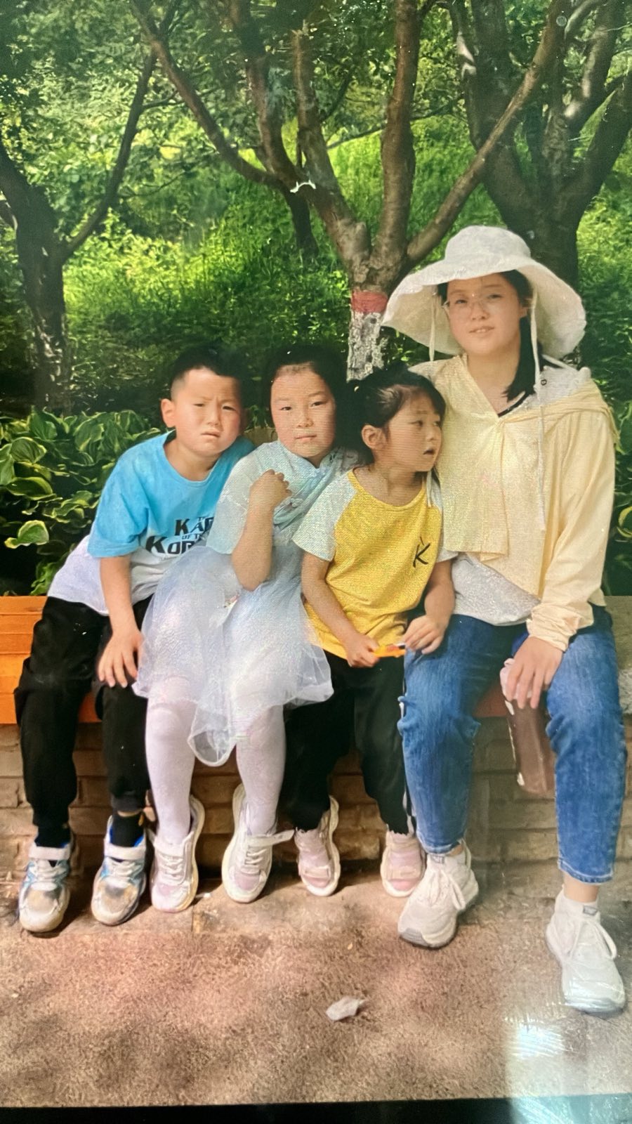 金月和她的孩子們。(明慧網)