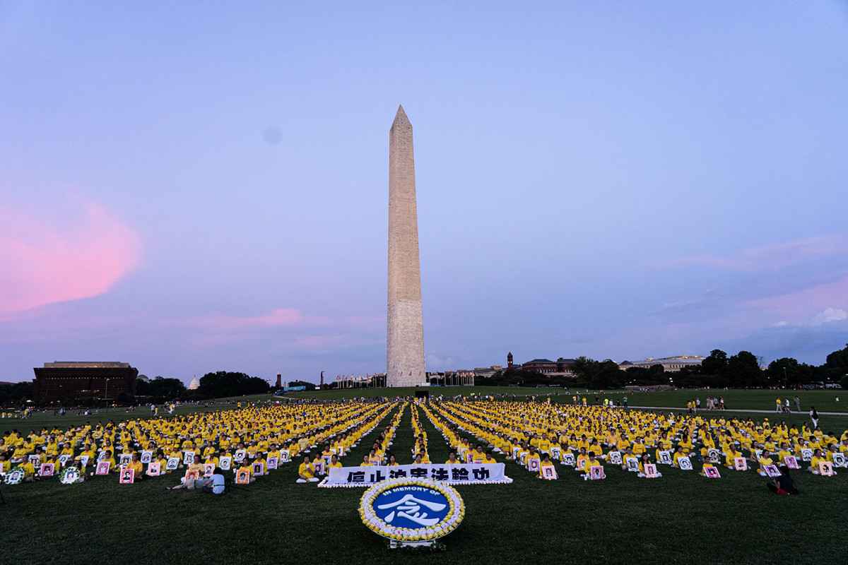 海外法輪功學員在華盛頓DC悼念在大陸被迫害致死的法輪功修煉者。（大紀元）