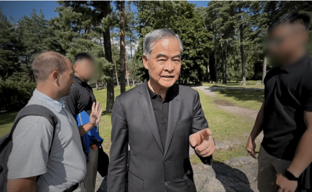 梁振英芬蘭威脅法輪功 追查國際：中共跨國鎮壓（有原聲片段）