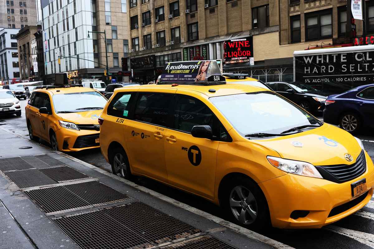 Uber公司日前宣布與紐約TLC合作，將黃色的士列入其App中。（Michael M. Santiago/Getty Image）