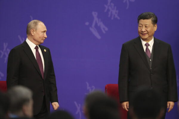 2022年2月4日，中共領導人習近平將在北京冬奧會開幕式當天與俄羅斯總統普京會面。普京和習近平資料照。(Kenzaburo Fukuhara/Pool/Getty Images)