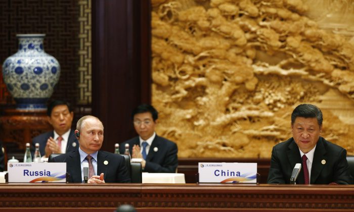 2017年5月15日，俄羅斯總統弗拉基米爾‧普京和中國領導人習近平，出席在北京舉辦的「一帶一路」國際合作高峰論壇。（Thomas Peter-Pool/Getty Images）