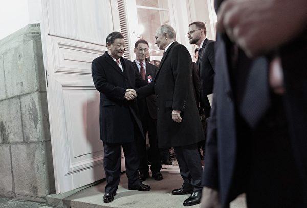 2023年3月21日，習近平離開克里姆林宮時告訴普京，共同推動「百年變局」。（Pavel Byrkin/SPUTNIK/AFP via Getty Images）
