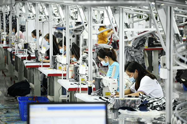 圖為中國的工廠。（STR / AFP）