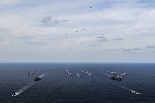 11月21日，澳洲、加拿大、德國、美國海軍和日本海上自衛隊的17艘艦艇在菲律賓海進行ANNUALEX 2021多邊演習。（美國海軍）