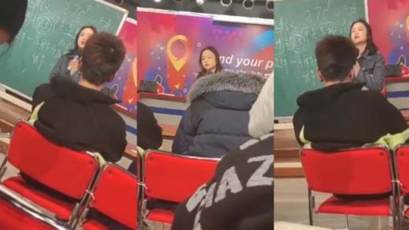 2021年12月14日，上海高校女教師宋庚一在課堂上要求學生理性看待南京大屠殺。（網絡影片截圖）