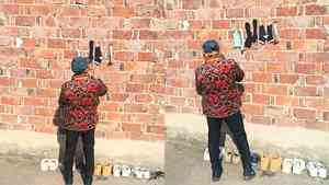 中國老人「貼燒餅」式曬襪子 影片熱傳