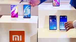 李在明訪華持小米手機與習自拍 網民紛提醒要小心