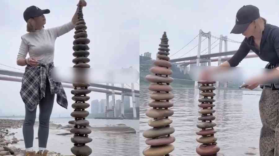 女子江邊搭石塔走紅 一小時壘至三十三層（影片）